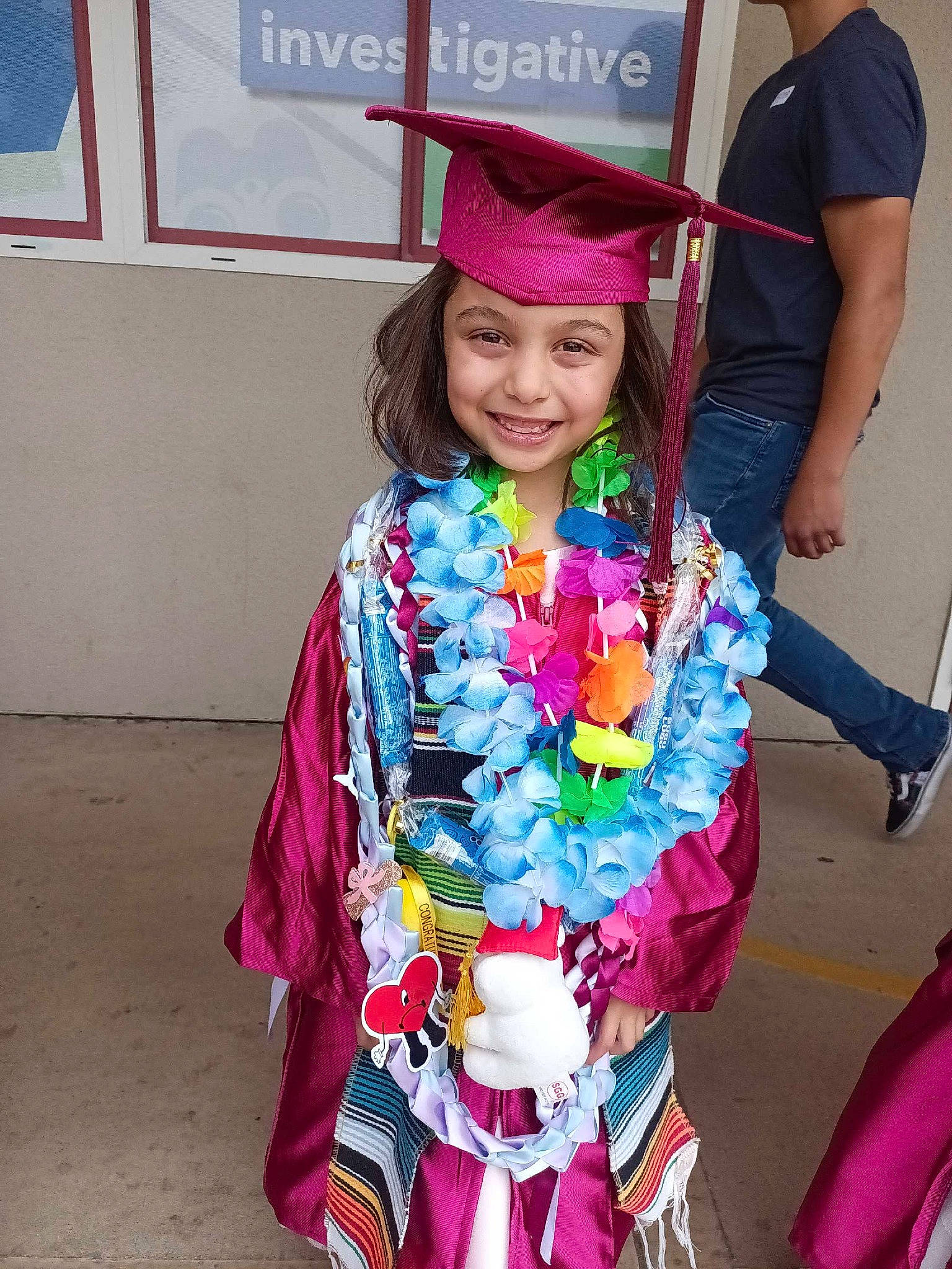 Sabina joined the competition — help win amazing prizes! academic_institution, child, costume, electric_blue, event, facial_expression, fashion_accessory, fashion_design, fun, happy, headwear, joy, magenta, mortarboard, person, pink, public_event, purple, sleeve, smile