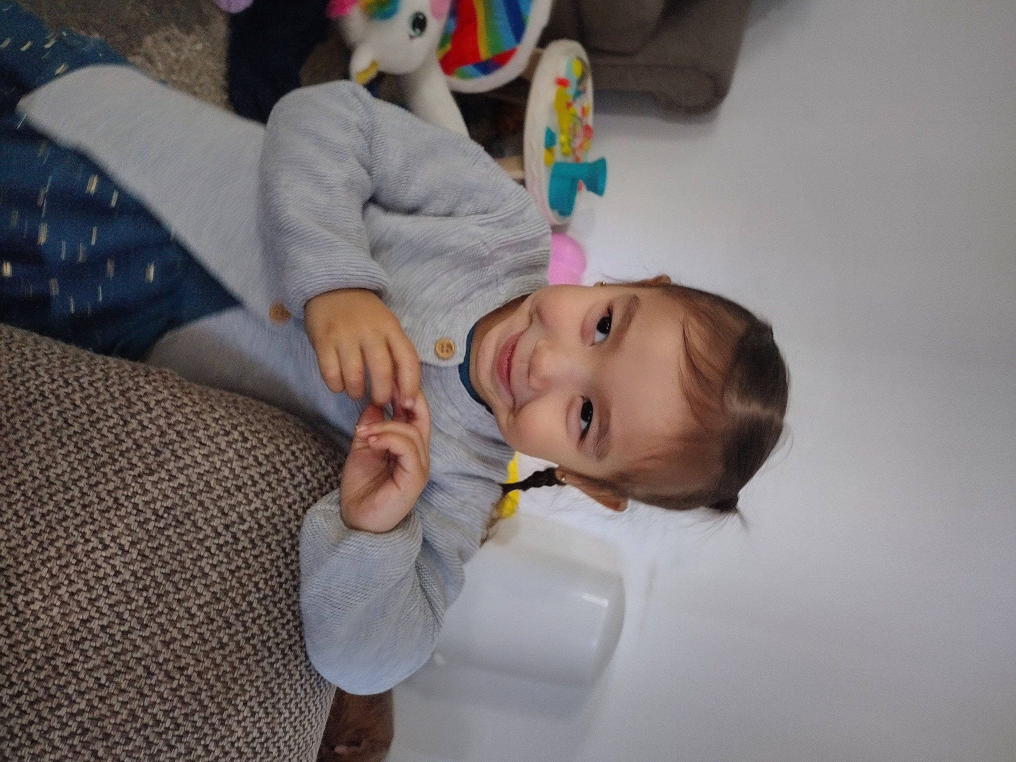 Marissa is registered to the contest to win money with this photo: baby, baby_products, baby_toddler_clothing, child, comfort, fun, happy, joy, linens, person, plush, room, skin, smile, stuffed_toy, toddler, toy