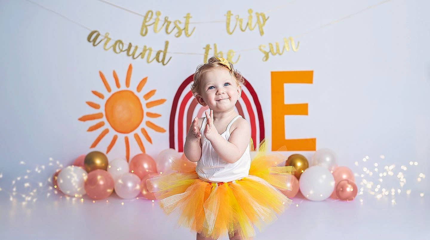 Raya joined the competition — help win amazing prizes! baby, baby_toddler_clothing, child, event, facial_expression, font, fun, graphics, happy, joy, magenta, party_supply, pattern, peach, person, petal, photo_caption, pink, poster, smile