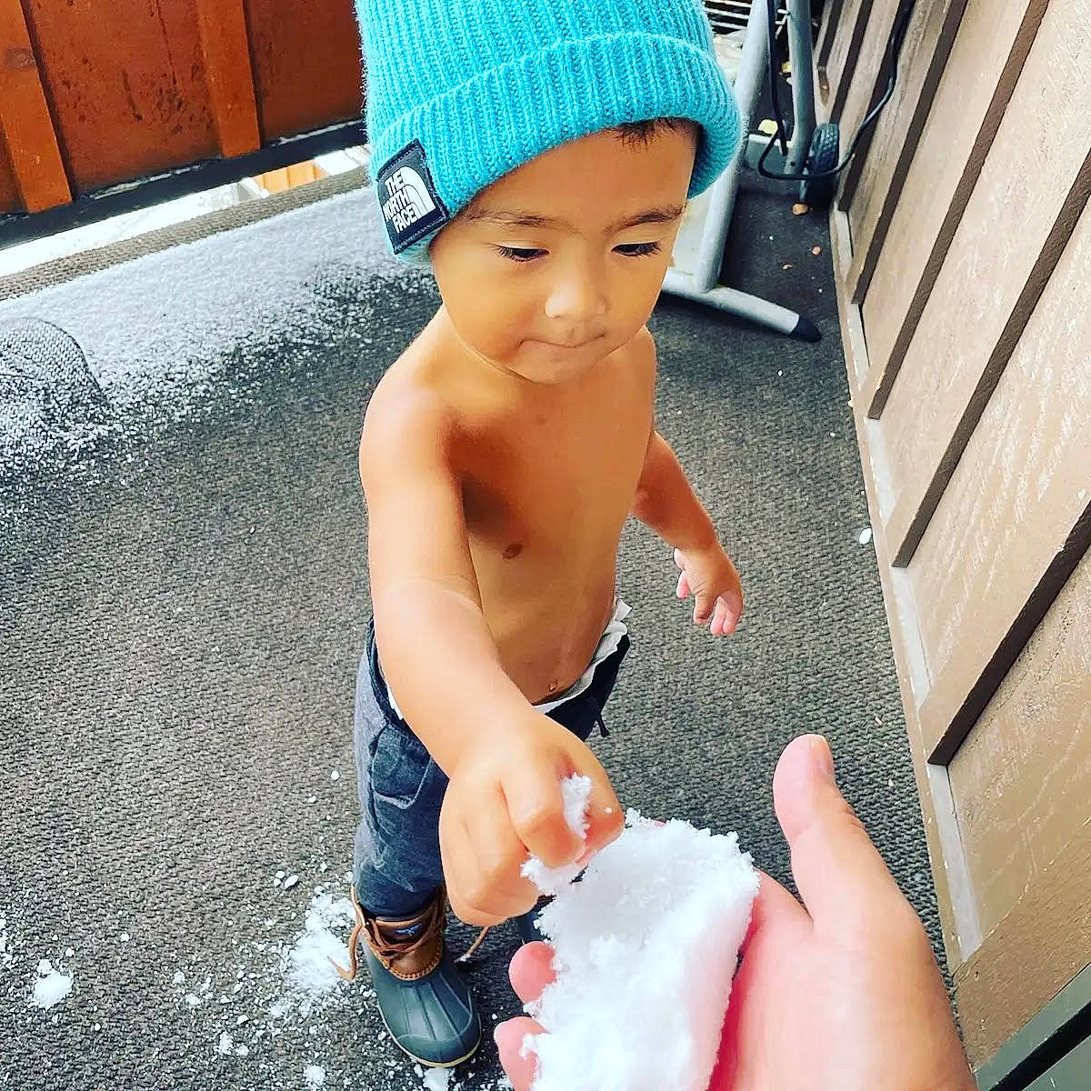 Blue is registered to the contest to win money with this photo: asphalt, barefoot, bathing, beauty, blue, cap, chest, child, cool, electric_blue, flooring, foot, fun, happy, headwear, human_leg, leisure, person, thigh, thumb