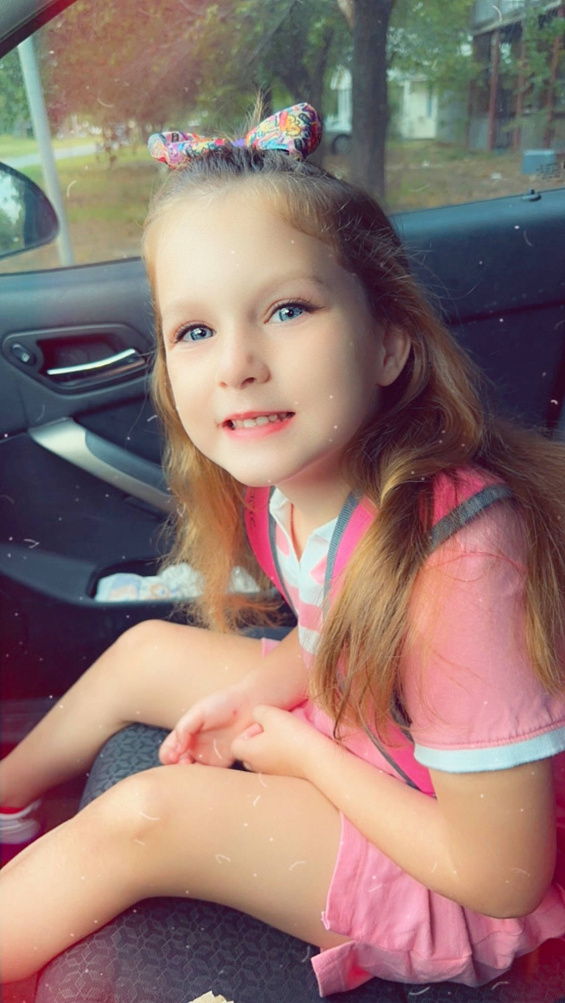 Gracie joined the competition — help win amazing prizes! black_hair, brown_hair, chin, cool, eye, finger, fun, gesture, hair, happy, human_leg, joy, lip, long_hair, person, pink, skin, smile, steering_wheel, thigh