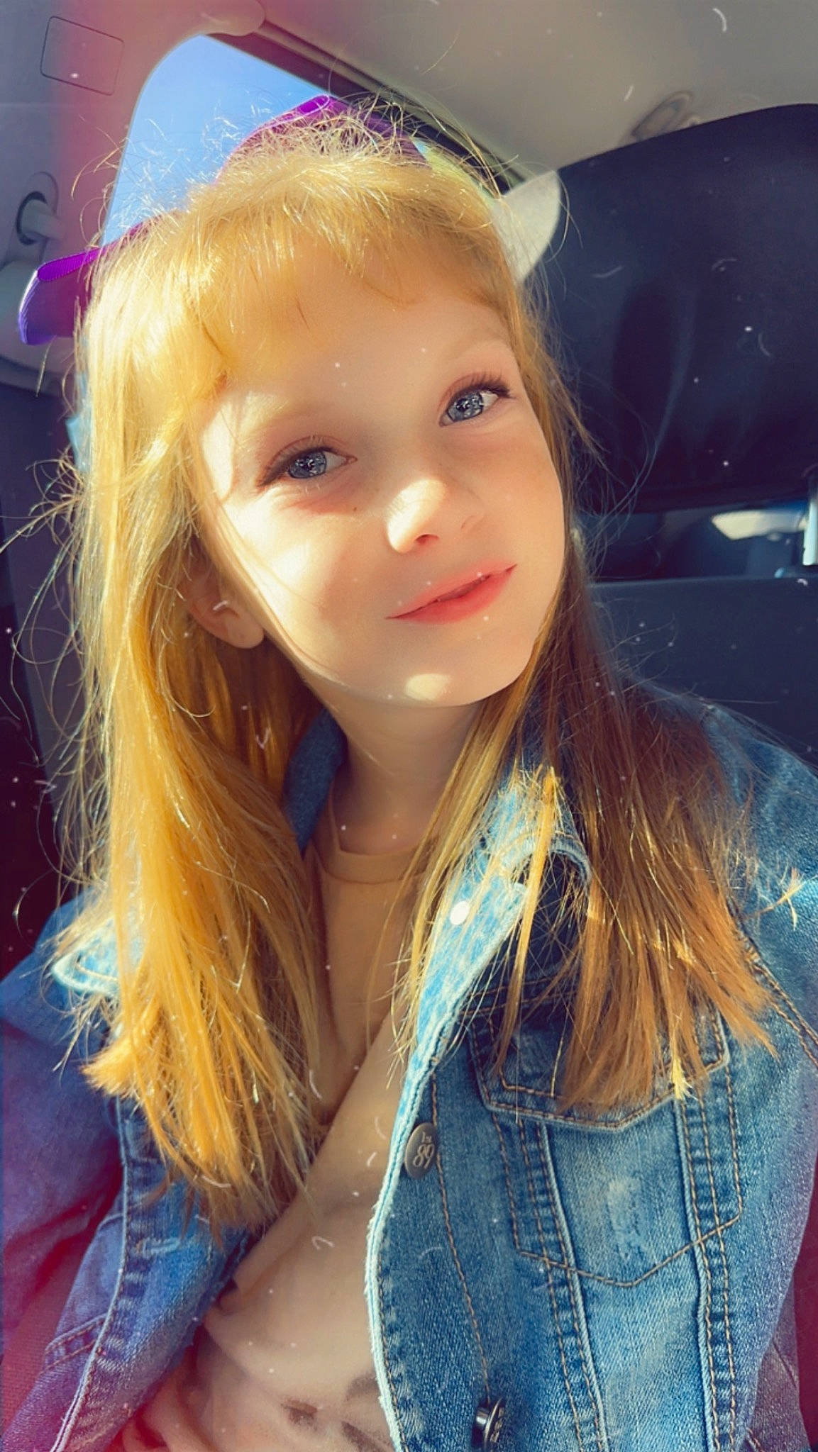 Emma is registered to the contest to win money with this photo: bangs, blond, brown_hair, denim, electric_blue, eyebrow, eyelash, feathered_hair, flash_photography, fun, hair, happy, iris, joy, layered_hair, lip, long_hair, person, selfie, skin