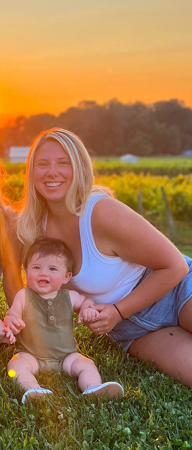 Kaden is registered to the contest to win money with this photo: face, flash_photography, grass, hair, happy, joy, leisure, light, morning, nature, orange, people, people_in_nature, person, photograph, plant, skin, smile, summer, sunlight