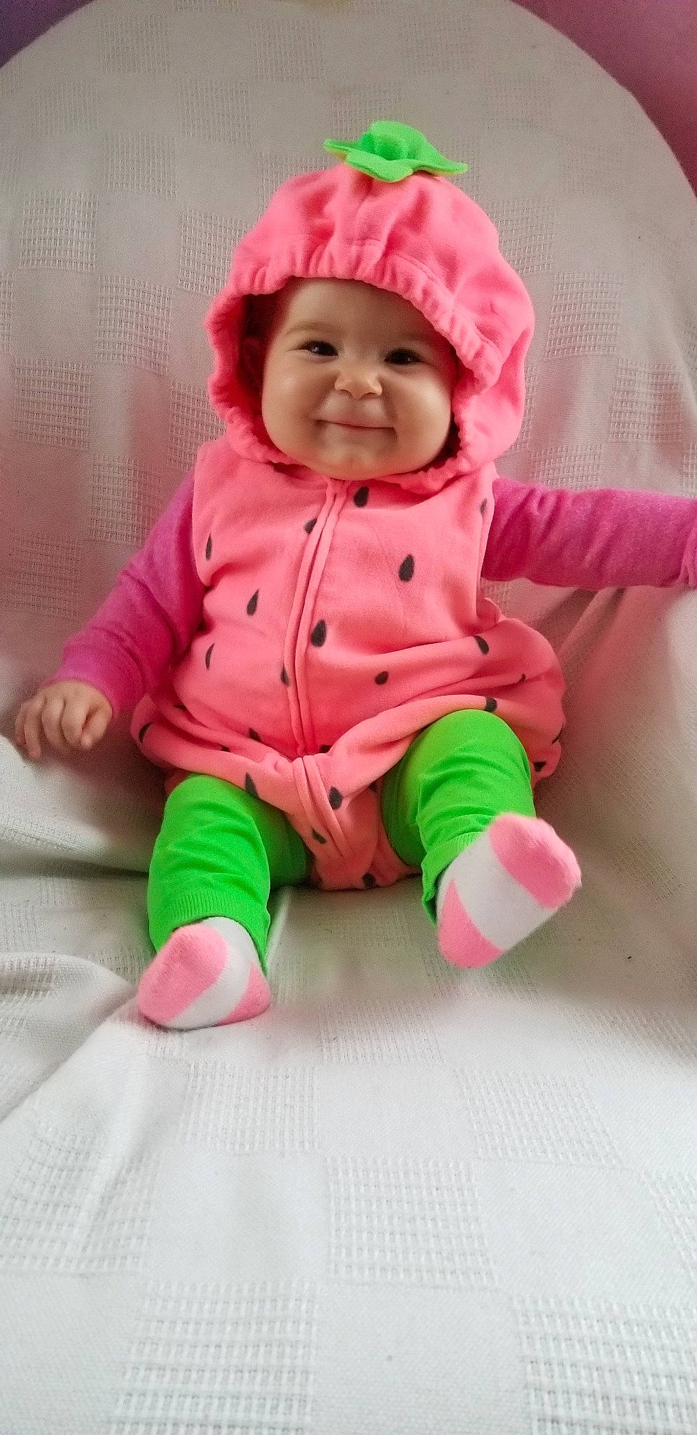 Serenity is registered to the contest to win money with this photo: baby_products, child, green, headwear, infant, joy, magenta, outerwear, person, pink, play, product, skin, smile, textile, toddler, toy
