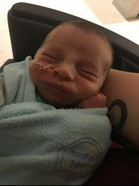 Osiris is registered to the contest to win money with this photo: bedtime, cheek, child, ear, finger, forehead, hand, head, infant, lip, mouth, nap, nose, person, product, sleep