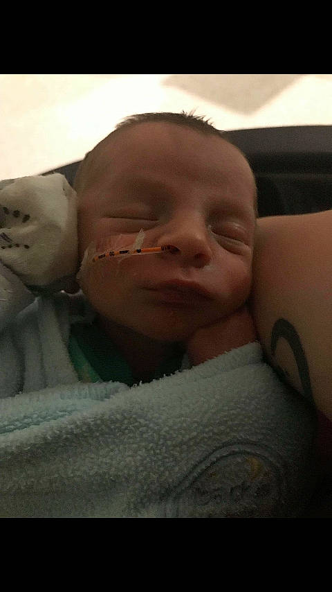 Osiris is registered to the contest to win money with this photo: arm, bedtime, cheek, child, chin, close_up, eye, face, finger, forehead, girl, hand, head, human, infant, mouth, neck, nose, person, skin