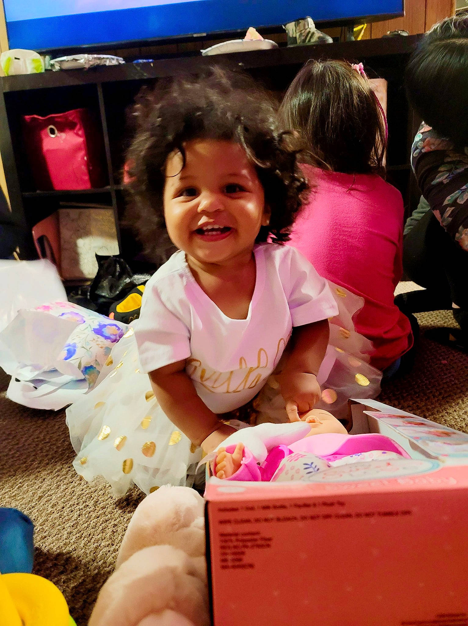 Nina joined the competition — help win amazing prizes! blue, box, child, event, fun, happy, joy, leisure, magenta, people, person, pink, room, sitting, skin, smile, sock, t_shirt, television, thigh