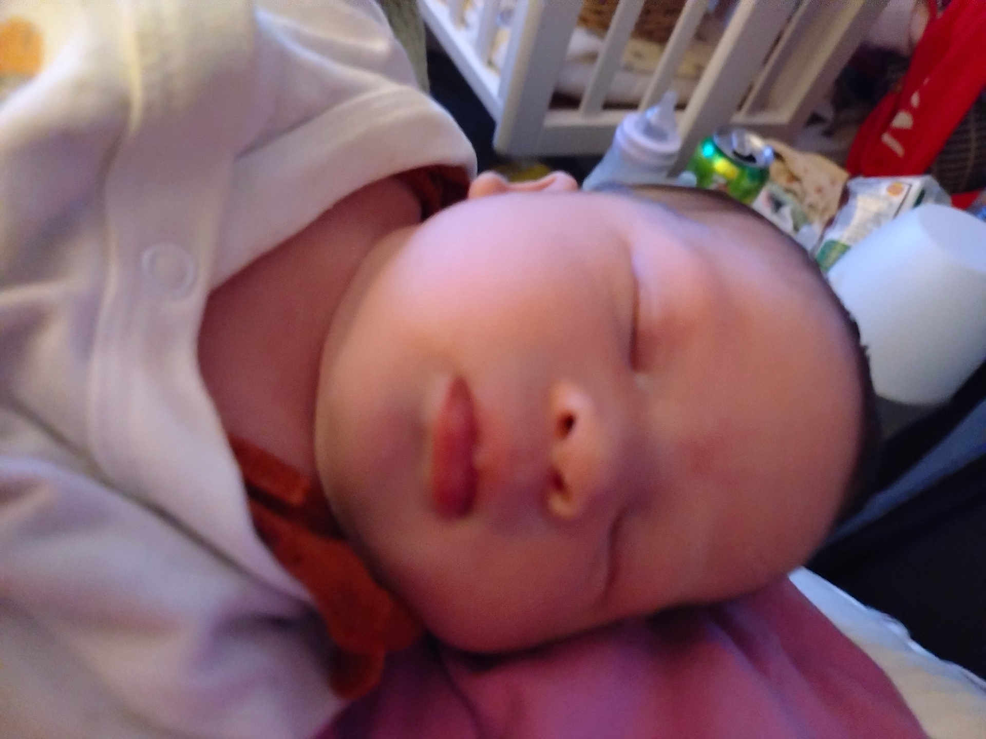 Liara-Sky joined the competition — help win amazing prizes! baby, sleeping, infant, closeup, face, soft_clothing, crib, indoor, resting, peaceful, newborn, person, head, skin, mouth, nose, eyelids, blanket, fabric, home