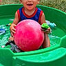 Leo joined the competition — help win amazing prizes! toddler, child, smiling, pool, water, toy, ball, green, plastic, outdoor, grass, summer, happy, curly_hair, play, fun, sunny, barefoot, person, backyard