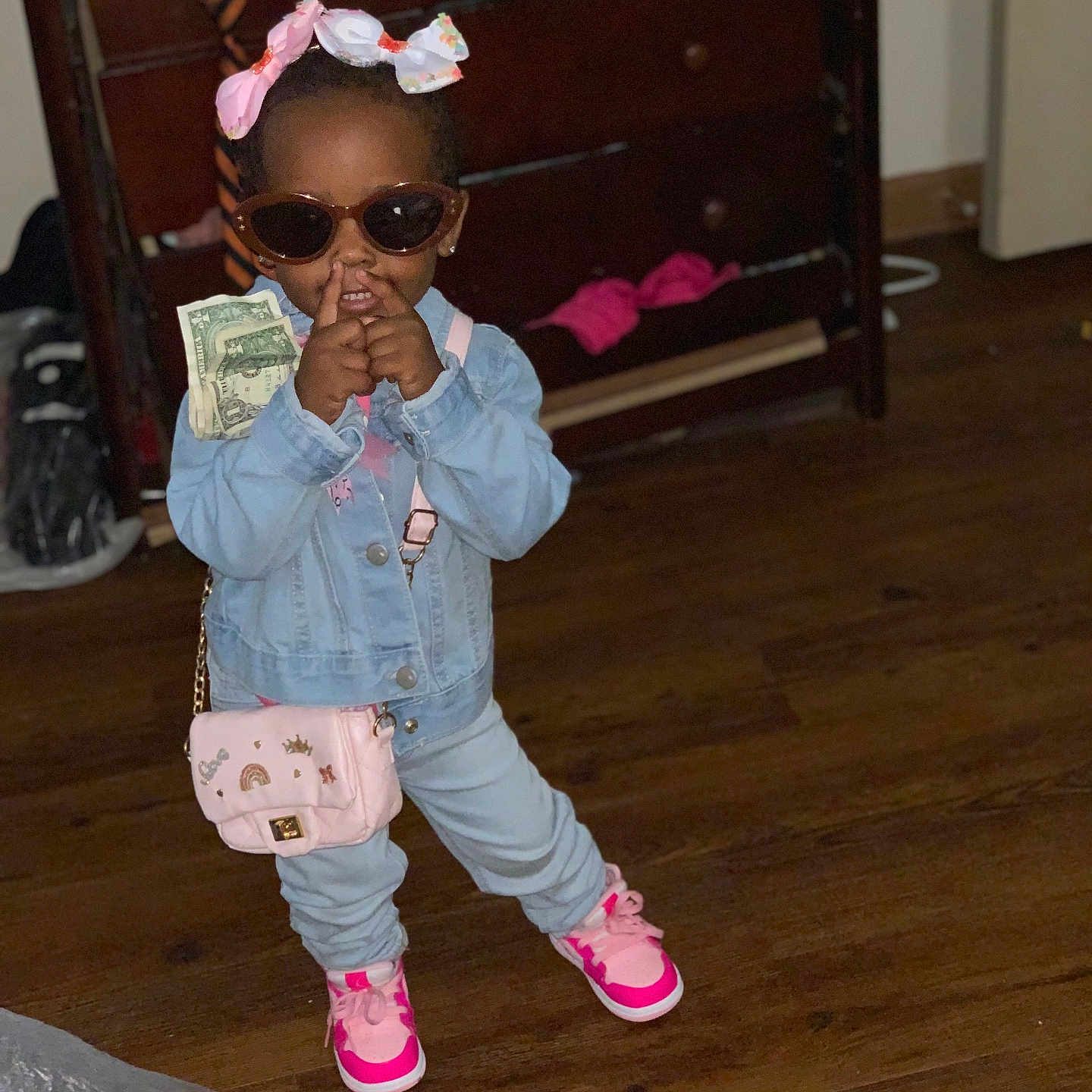 Kaliya is registered to the contest to win money with this photo: accessories, bag, child, clothing, coat, face, female, footwear, girl, glasses, hardwood, head, jacket, pants, person, photography, portrait, shoe, sunglasses, wood