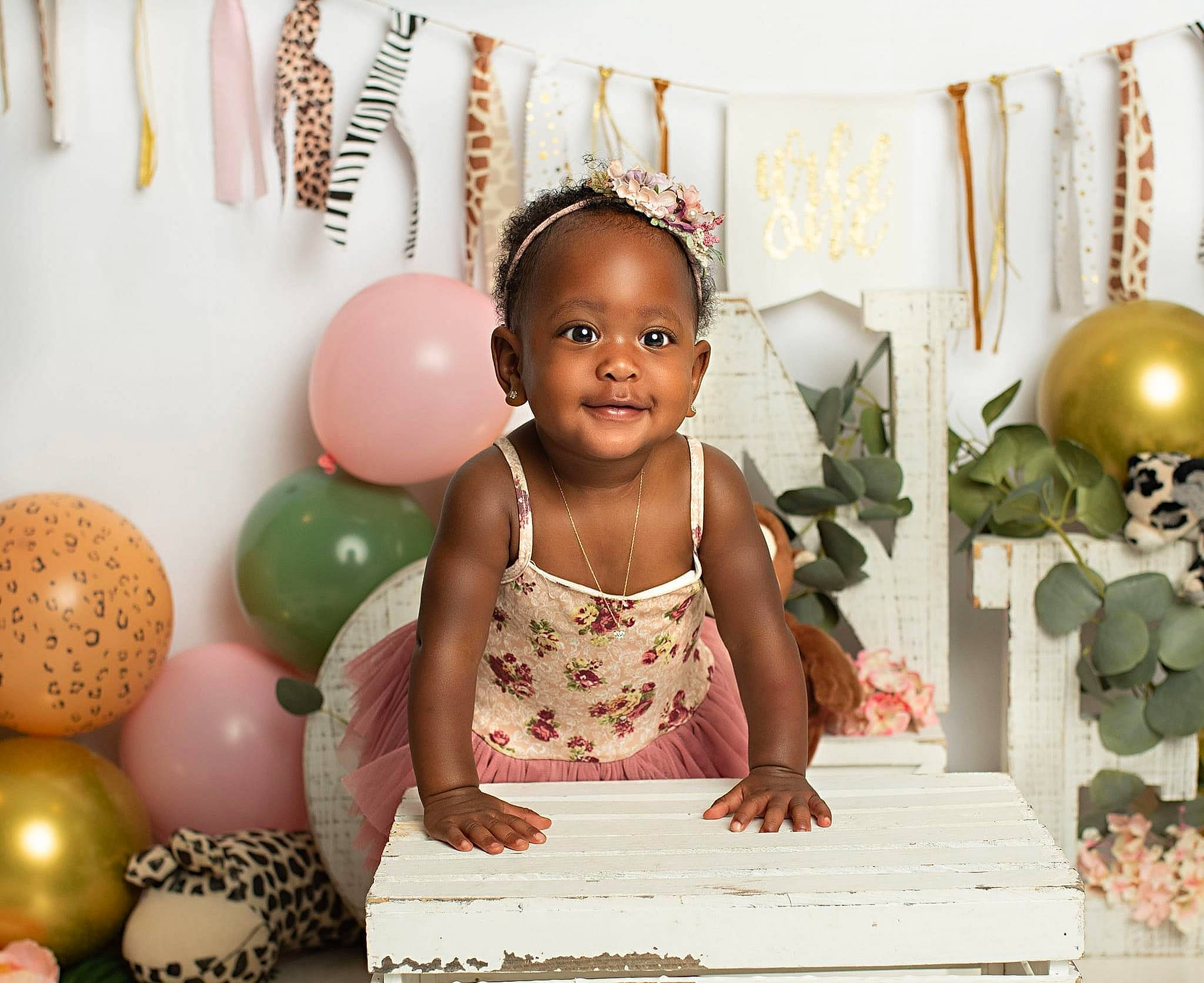 River is registered to the contest to win money with this photo: baby, baby_toddler_clothing, beauty, child, event, flooring, fun, happy, party_supply, people, person, photograph, pink, portrait_photography, room, sitting, smile, snapshot, toddler, white