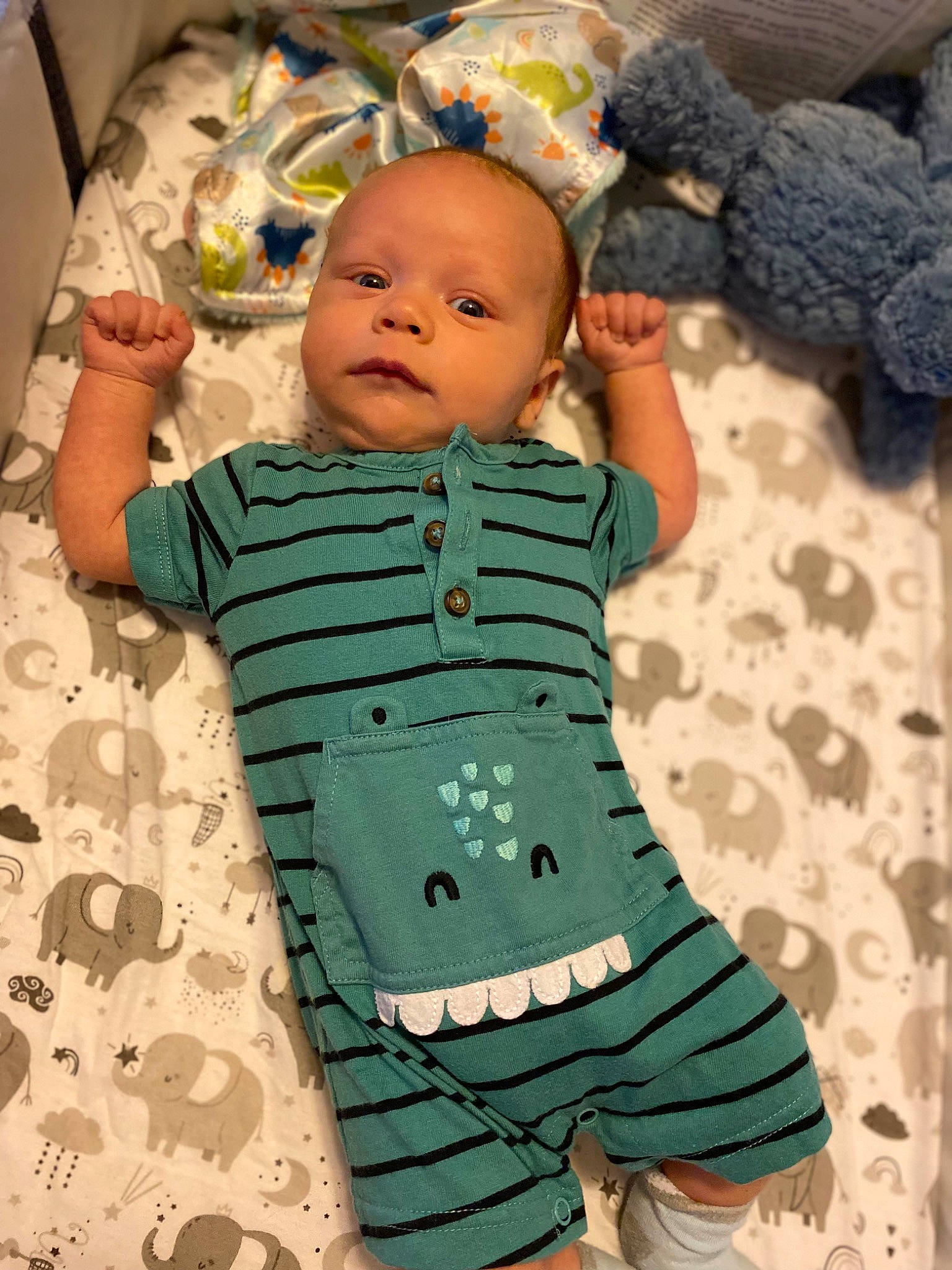 Juelz is registered to the contest to win money with this photo: baby, baby_products, baby_safety, baby_sleeping, baby_toddler_clothing, cheek, child, comfort, eye, green, linens, pattern, person, product, skin, sleeve, stuffed_toy, t_shirt, textile, toddler