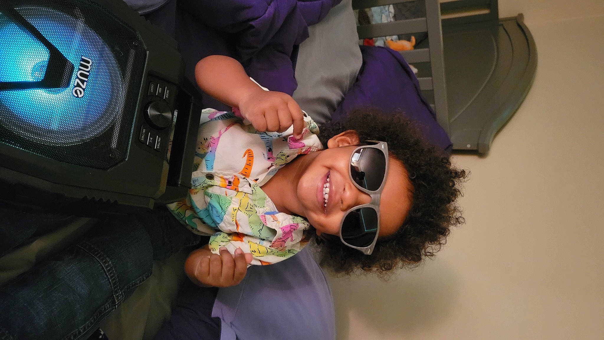 Demari joined the competition — help win amazing prizes! audio_equipment, black_hair, car_seat, child, cool, event, eyelash, eyewear, fun, goggles, happy, joy, mouth, person, personal_protective_equipment, room, smile, sunglasses, vision_care