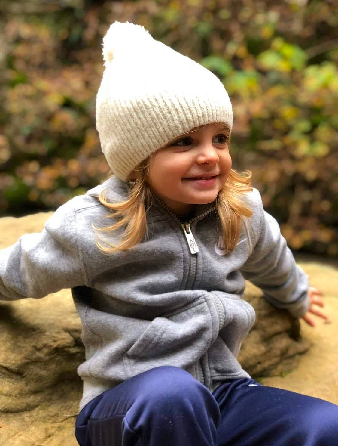 Snoh joined the competition — help win amazing prizes! beauty, blond, cap, fun, grass, happy, headgear, headwear, joy, knit_cap, landscape, leisure, nature, people_in_nature, person, sitting, skin, smile, standing, toddler