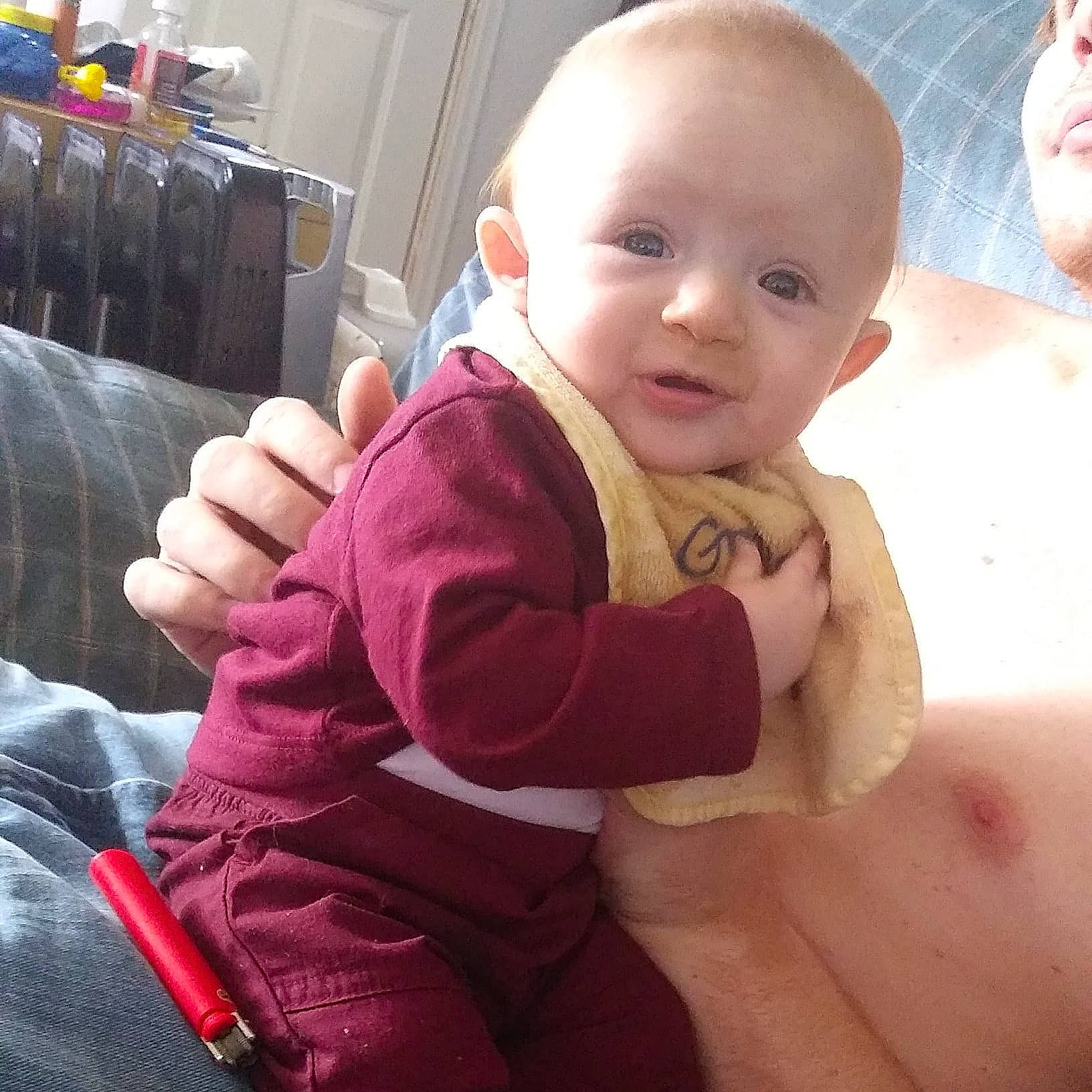 Arrow is registered to the contest to win money with this photo: baby, cheek, child, eye, face, finger, hand, head, mouth, person, skin, smile, thumb, toddler