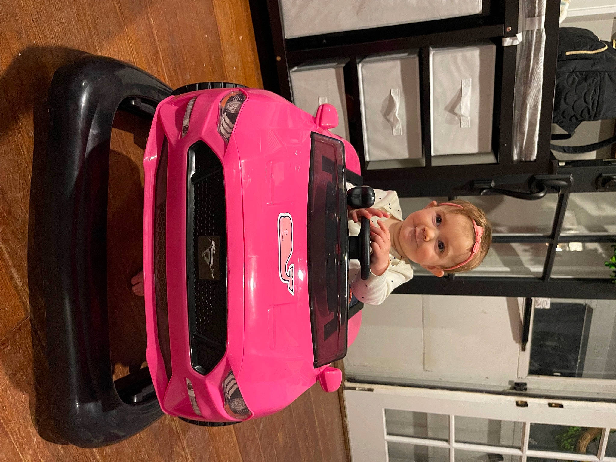 Hayden is registered to the contest to win money with this photo: audio_equipment, automotive_design, automotive_exterior, automotive_lighting, backpack, bag, baggage, bumper, car, gadget, helmet, joy, luggage_and_bags, machine, magenta, motor_vehicle, person, room, trunk, vehicle