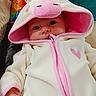 baby, infant, onesie, unicorn, hood, pink, white, face, eyes, cushion, blanket, cozy, clothing, child, indoor, cute, soft, portrait, young, babywear