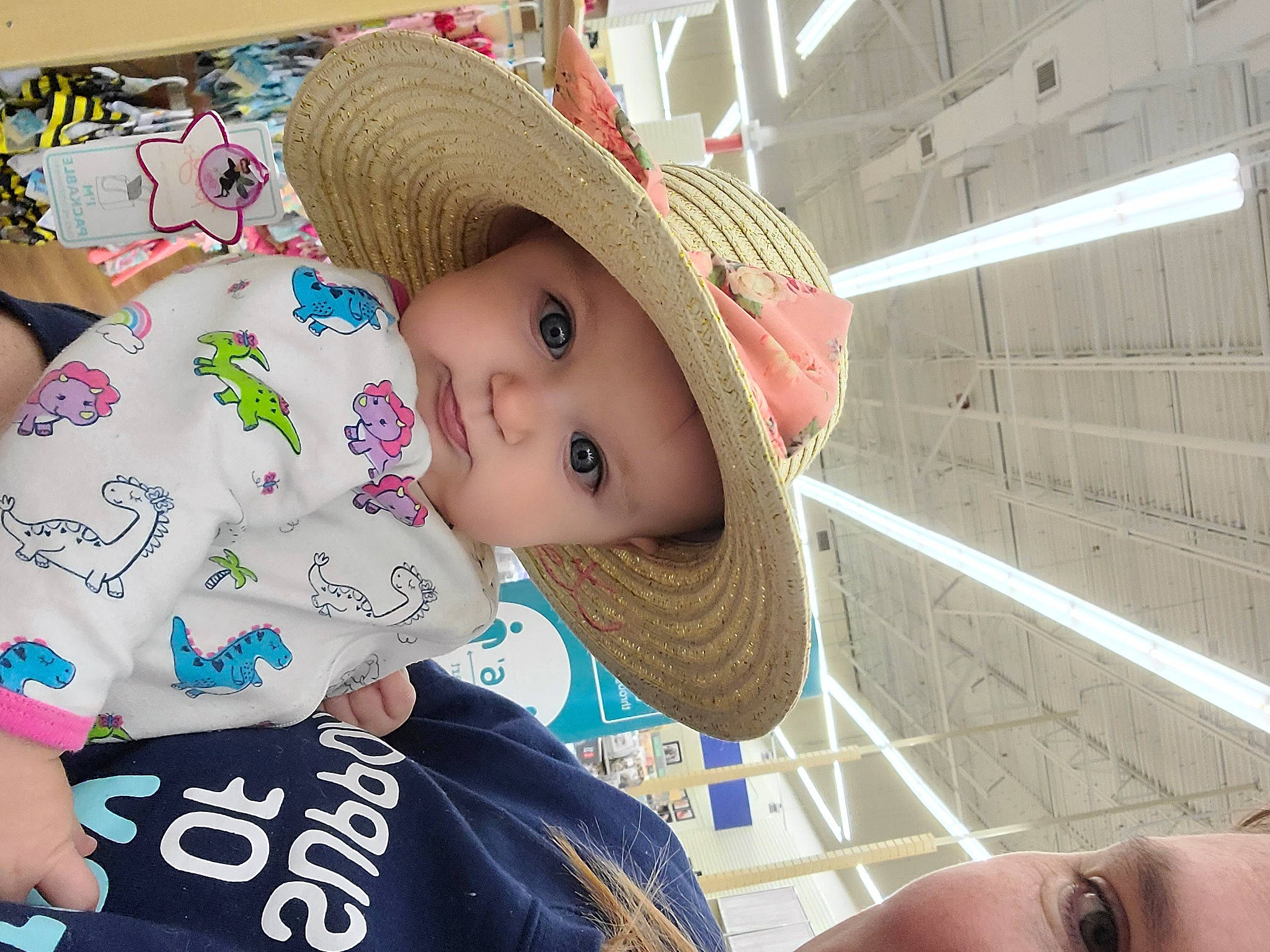 Erika is registered to the contest to win money with this photo: baby, baby_toddler_clothing, cap, cheek, chin, eye, eyebrow, eyelash, happy, hat, headgear, headwear, iris, lip, mouth, nose, person, skin, sleeve, sun_hat