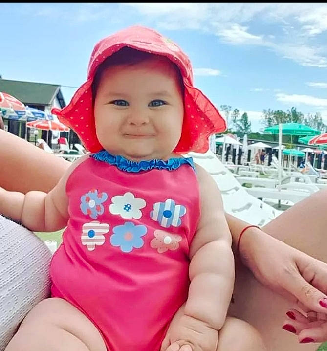 Daria joined the competition — help win amazing prizes! baby, baby_toddler_clothing, cloud, cool, face, finger, happy, headwear, joy, leisure, mouth, person, pink, product, recreation, skin, sky, sleeve, smile, thigh