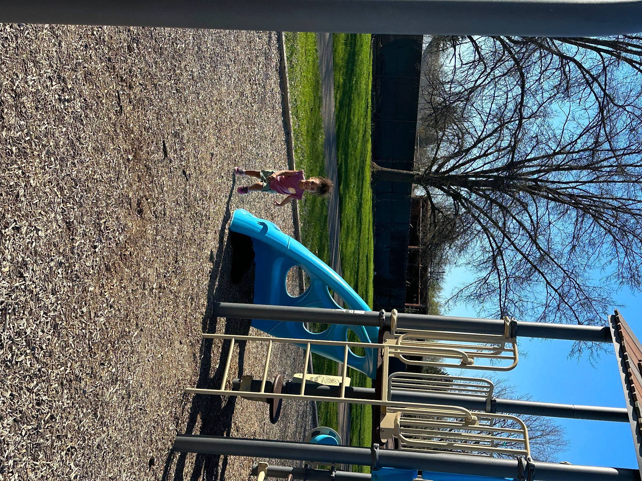 Kinsley is registered to the contest to win money with this photo: building, daylighting, electric_blue, facade, glass, grass, house, joy, leisure, person, plant, pole, rectangle, reflection, sky, soil, tints_and_shades, tree, twig, window