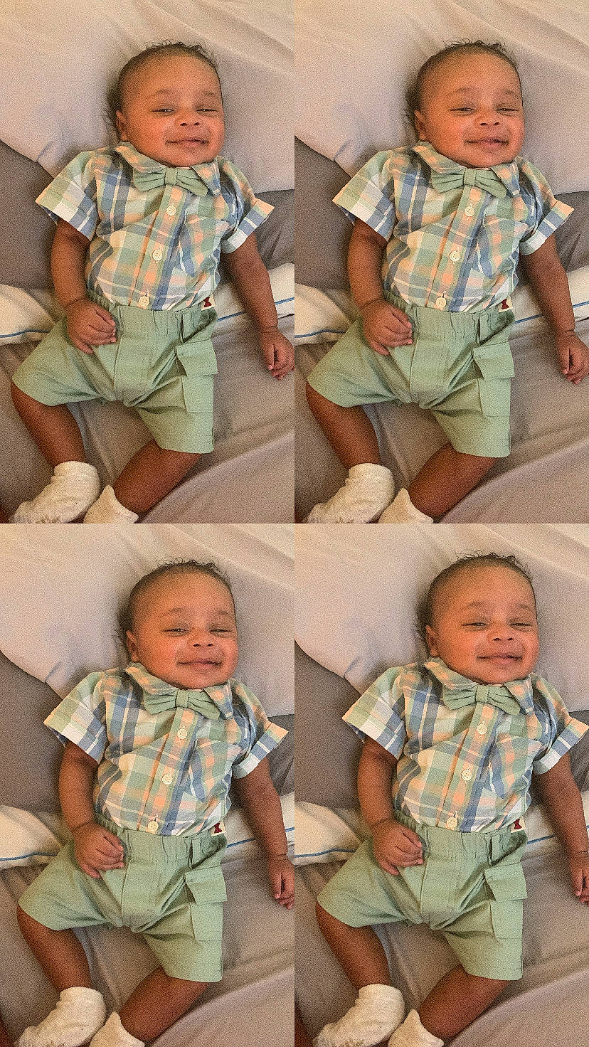 Calvin joined the competition — help win amazing prizes! baby_toddler_clothing, child, clothing, comfort, face, facial_expression, gesture, head, human, joy, organ, people, person, photograph, product, skin, sleeve, smile, standing, textile