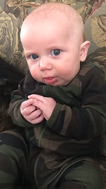 Donald joined the competition — help win amazing prizes! arm, baby_toddler_clothing, brown, cheek, clothing, comfort, ear, eye, finger, gesture, hand, head, iris, lip, mouth, nose, outerwear, person, skin, sleeve