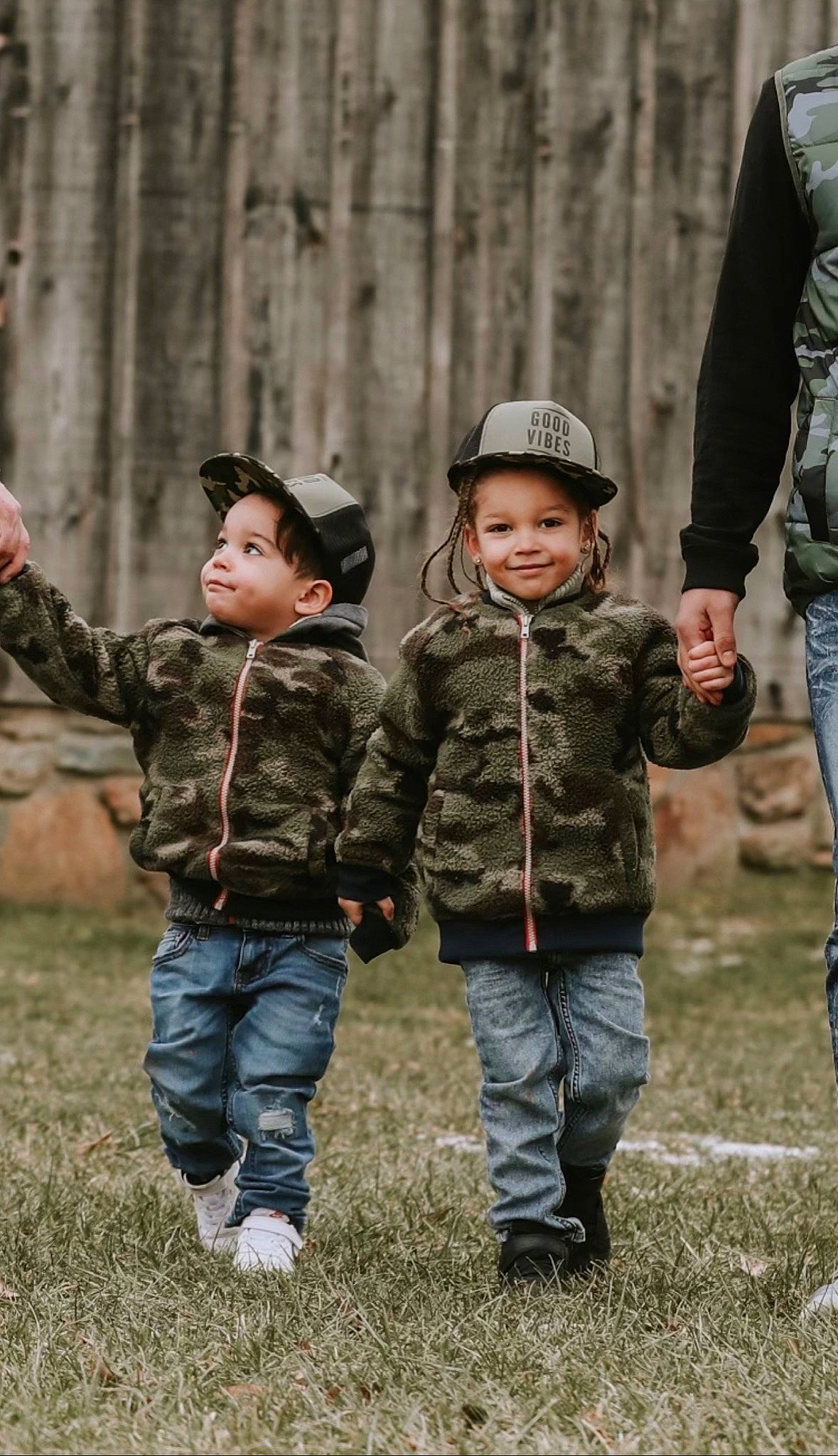 Phoenix is registered to the contest to win money with this photo: cap, child, fun, gesture, grass, grassland, happy, joy, landscape, leaf, leisure, military_organization, people_in_nature, person, play, recreation, smile, soil, soldier, toddler