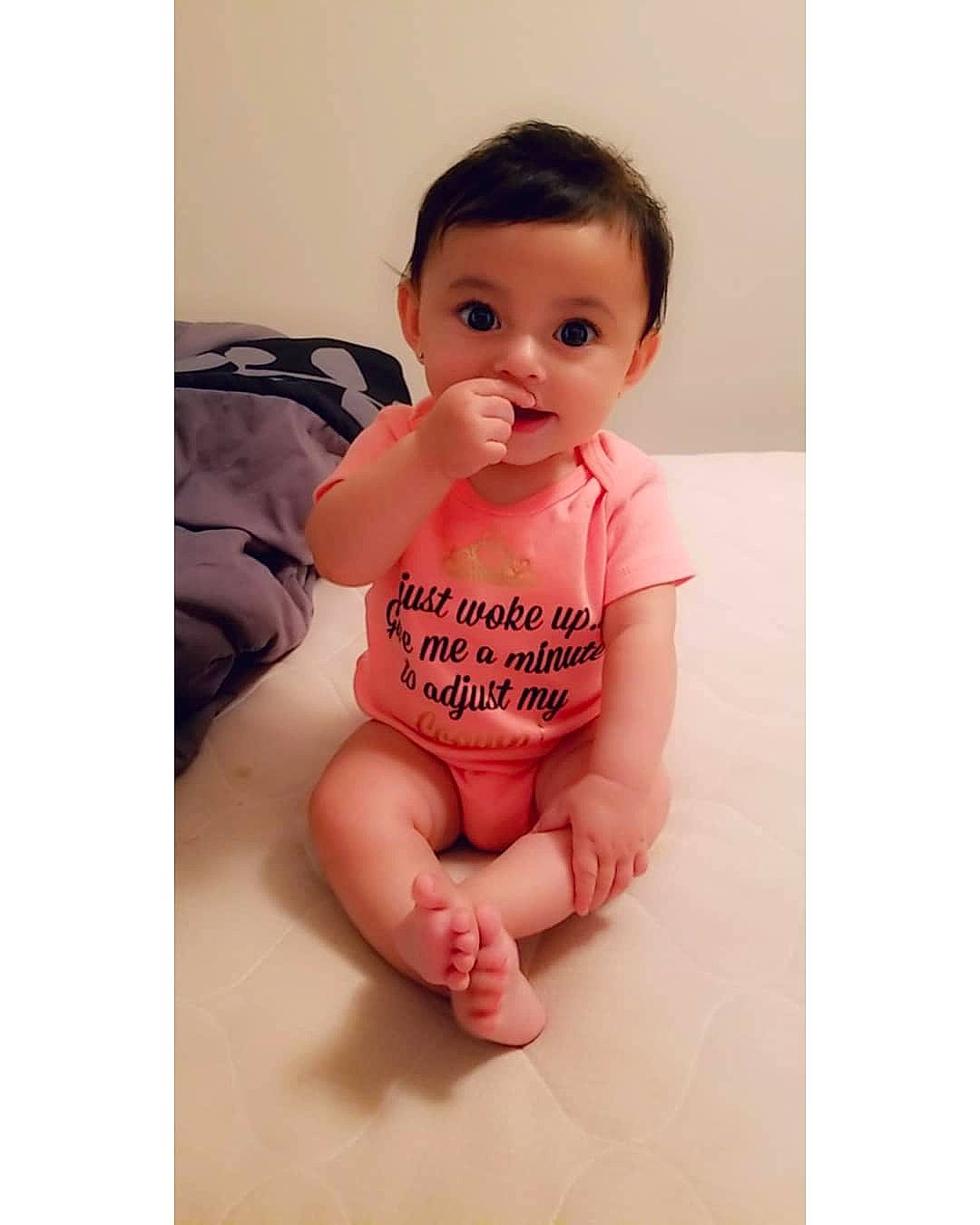 Valencia joined the competition — help win amazing prizes! baby, baby_toddler_clothing, cheek, child, finger, head, lip, person, pink, product, sitting, skin, sleeve, t_shirt, thumb, toddler