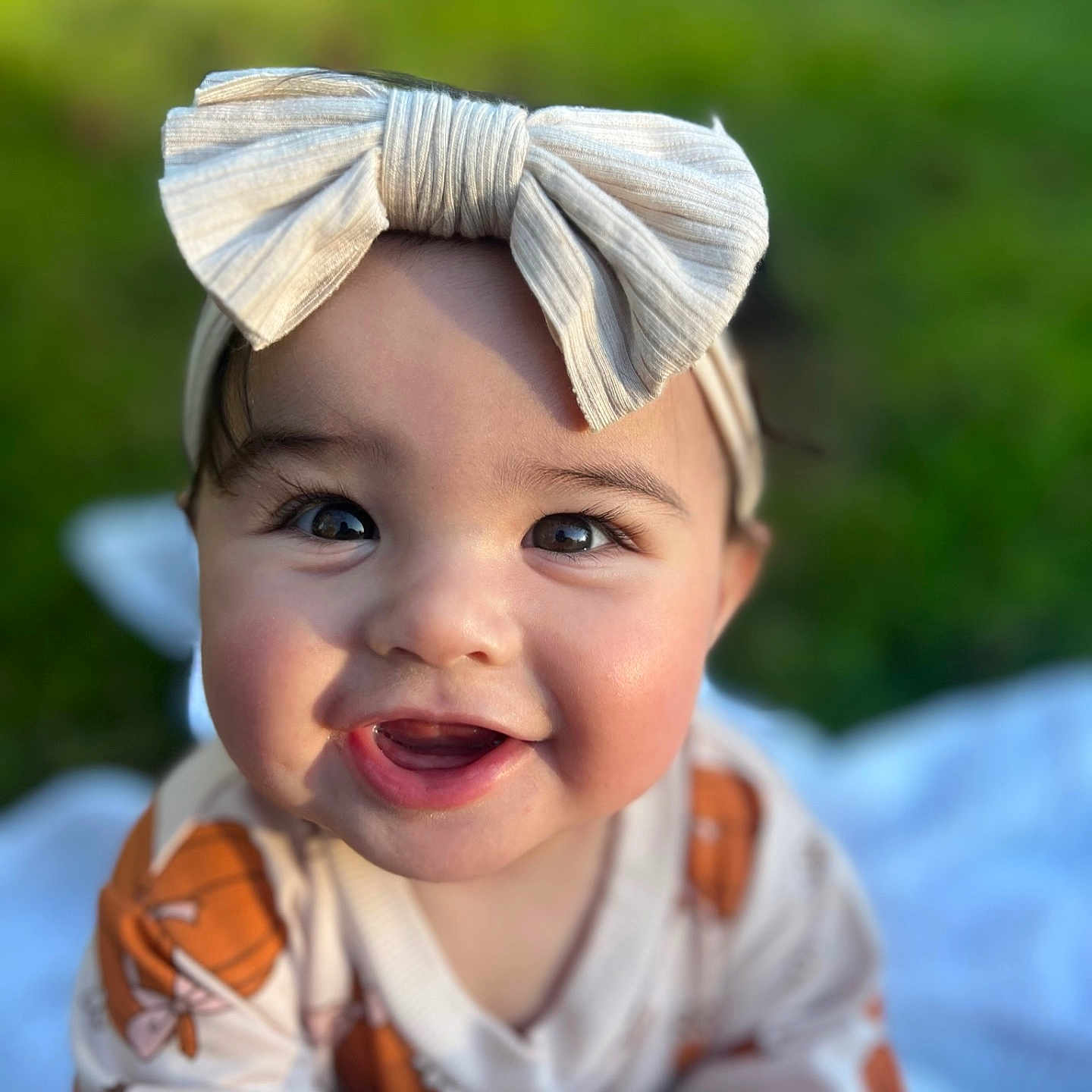 Tallula joined the competition — help win amazing prizes! accessories, baby, babylaughing, bodypart, clothing, costume, dress, face, formalwear, grass, happy, hat, head, laughing, person, photography, plant, portrait, smile, tie