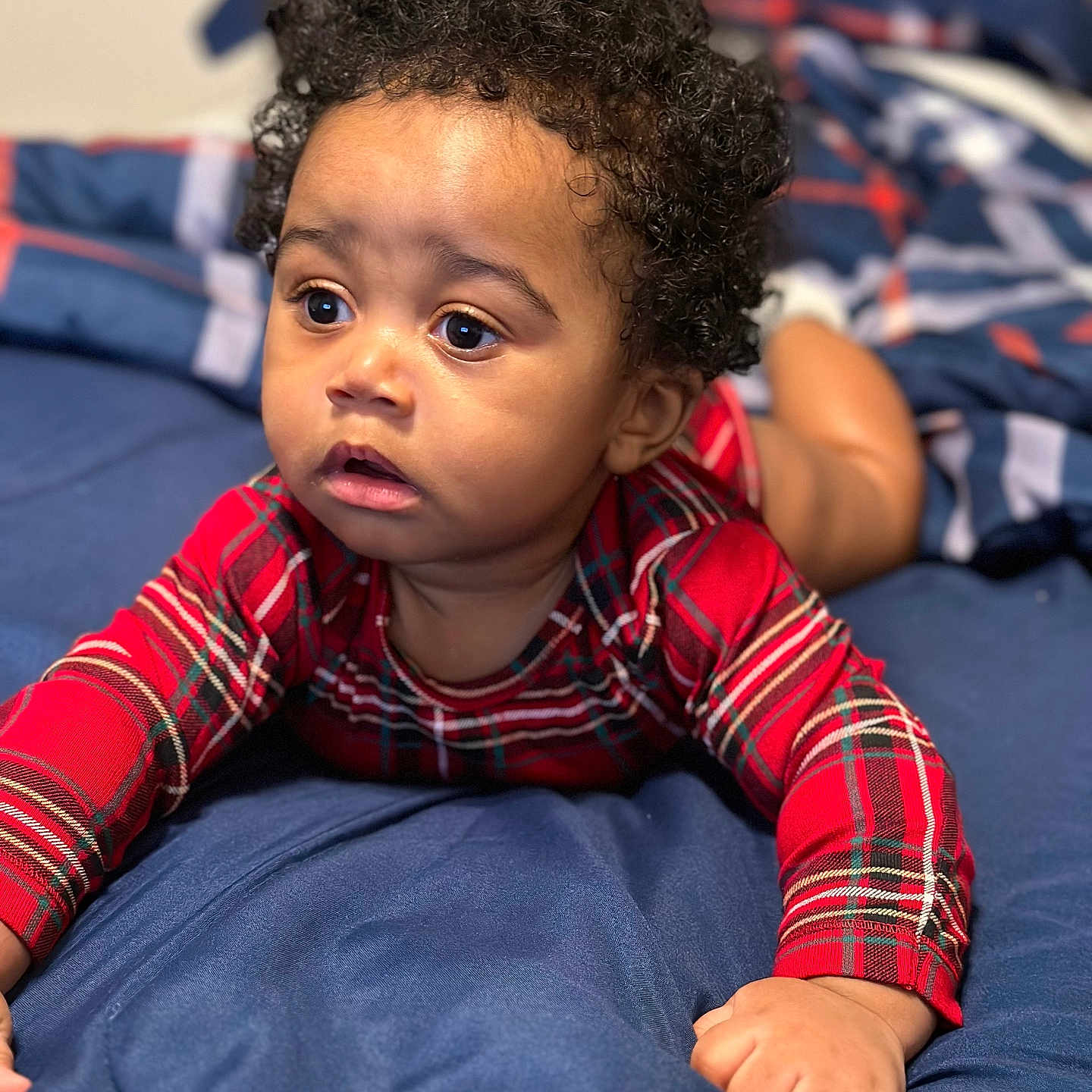 Milan is registered to the contest to win money with this photo: baby, babycrawling, bed, bedroom, blackhair, blanket, bodypart, crawling, face, finger, furniture, hair, hand, happy, head, indoors, person, photography, portrait, room