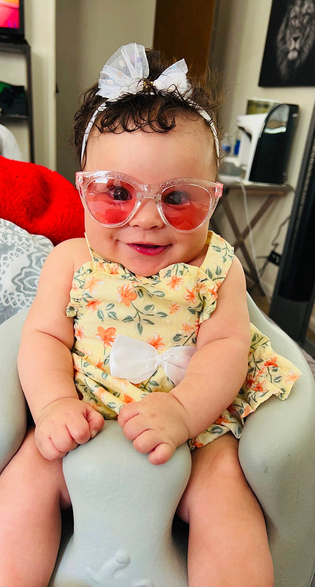 Kaelynn is registered to the contest to win money with this photo: baby, baby_toddler_clothing, cheek, chin, dress, eyewear, face, finger, glasses, goggles, happy, head, lip, mouth, person, skin, sleeve, smile, sunglasses, toddler