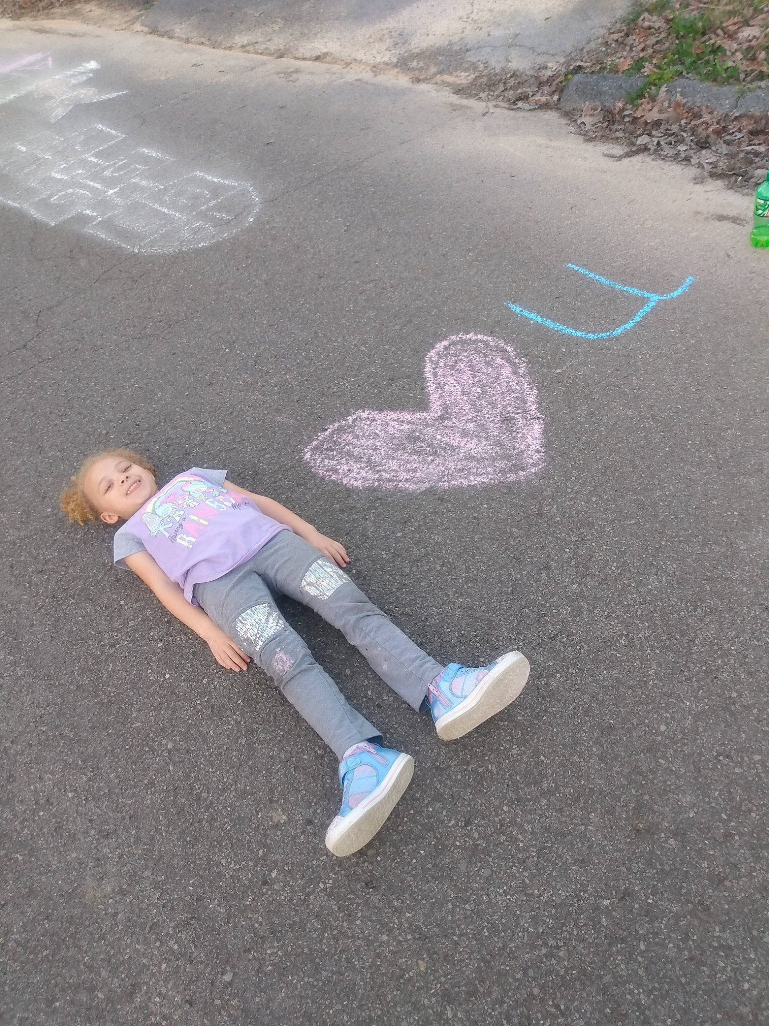 Abigail is registered to the contest to win money with this photo: asphalt, beach, chalk, child, joy, leisure, person, sand, vacation