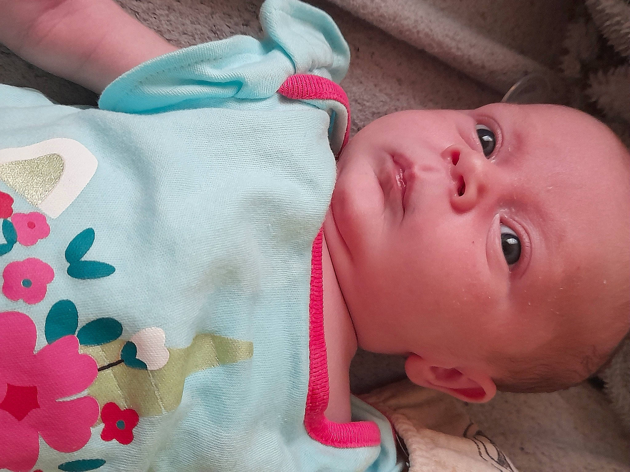 Ellie-rose is registered to the contest to win money with this photo: baby, baby_toddler_clothing, cheek, eye, eyebrow, eyelash, face, hand, human_body, iris, lip, mouth, neck, nose, person, pink, product, skin, sleeve, textile