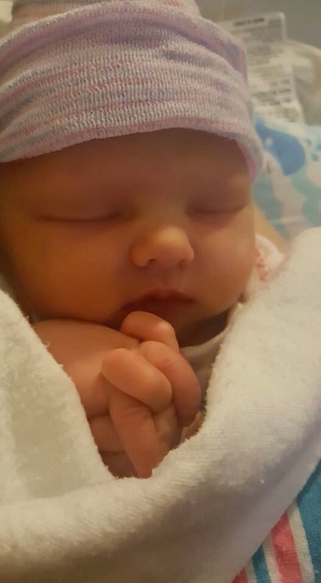 Kayla is registered to the contest to win money with this photo: bedtime, cheek, child, childbirth, close_up, finger, girl, hand, headwear, infant, lip, nap, nose, person, product, skin, sleep, toddler