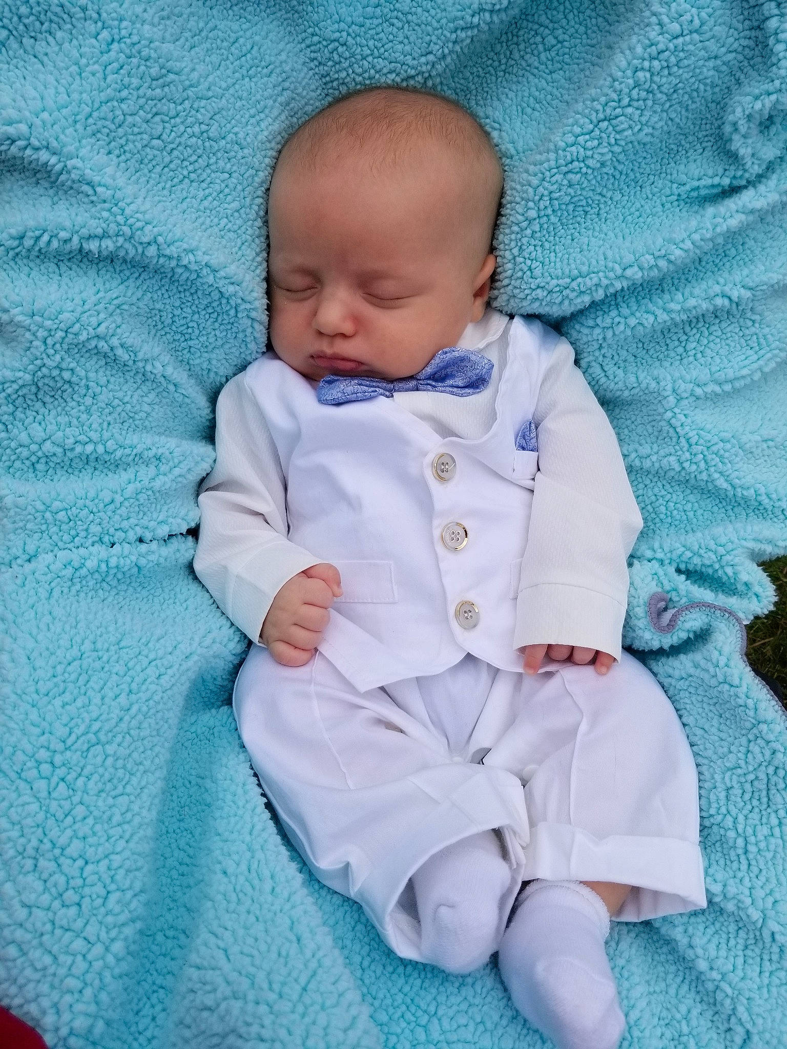 Theodore is registered to the contest to win money with this photo: baby, baby_products, baby_sleeping, baby_toddler_clothing, blue, child, linens, person, product, skin, smile, toddler