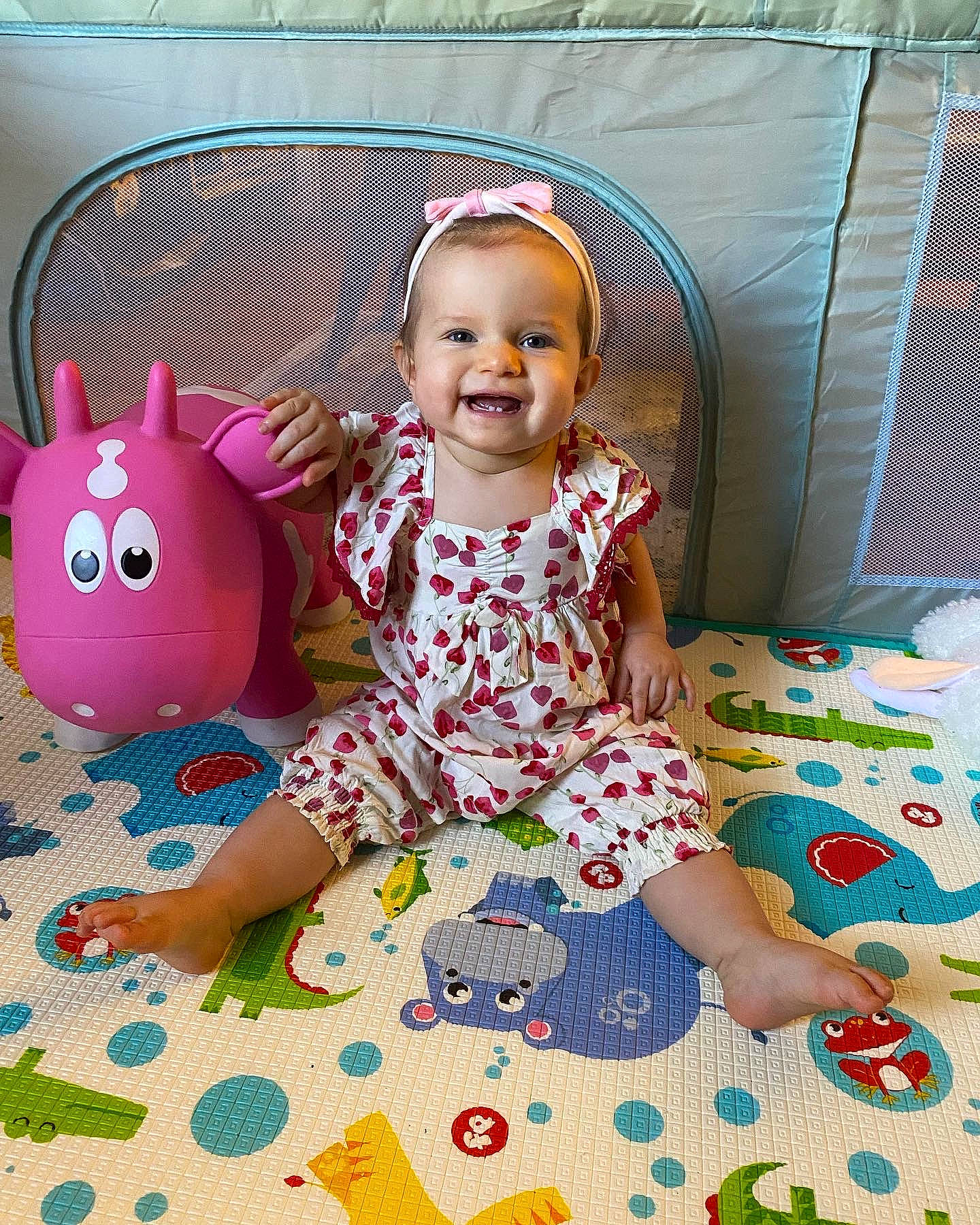 Presley joined the competition — help win amazing prizes! baby, baby_toddler_clothing, baby_toys, child, comfort, face, flooring, fun, happy, head, joy, magenta, pattern, person, pink, play, purple, red, sitting, smile