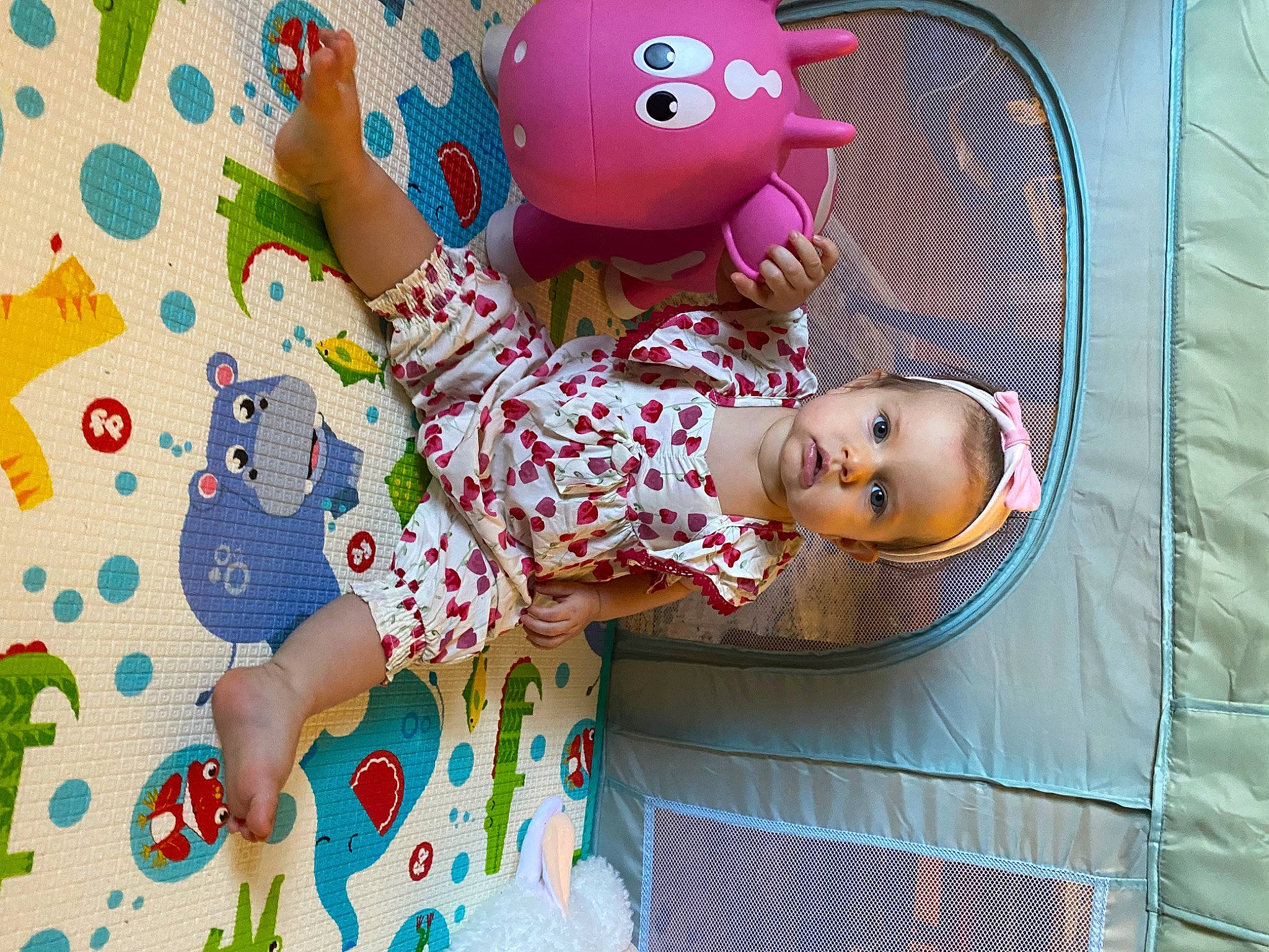 Presley is registered to the contest to win money with this photo: baby_products, baby_toddler_clothing, baby_toys, child, doll, fun, happy, leisure, linens, magenta, mammal, party_supply, pattern, person, pink, plush, room, stuffed_toy, textile, toy