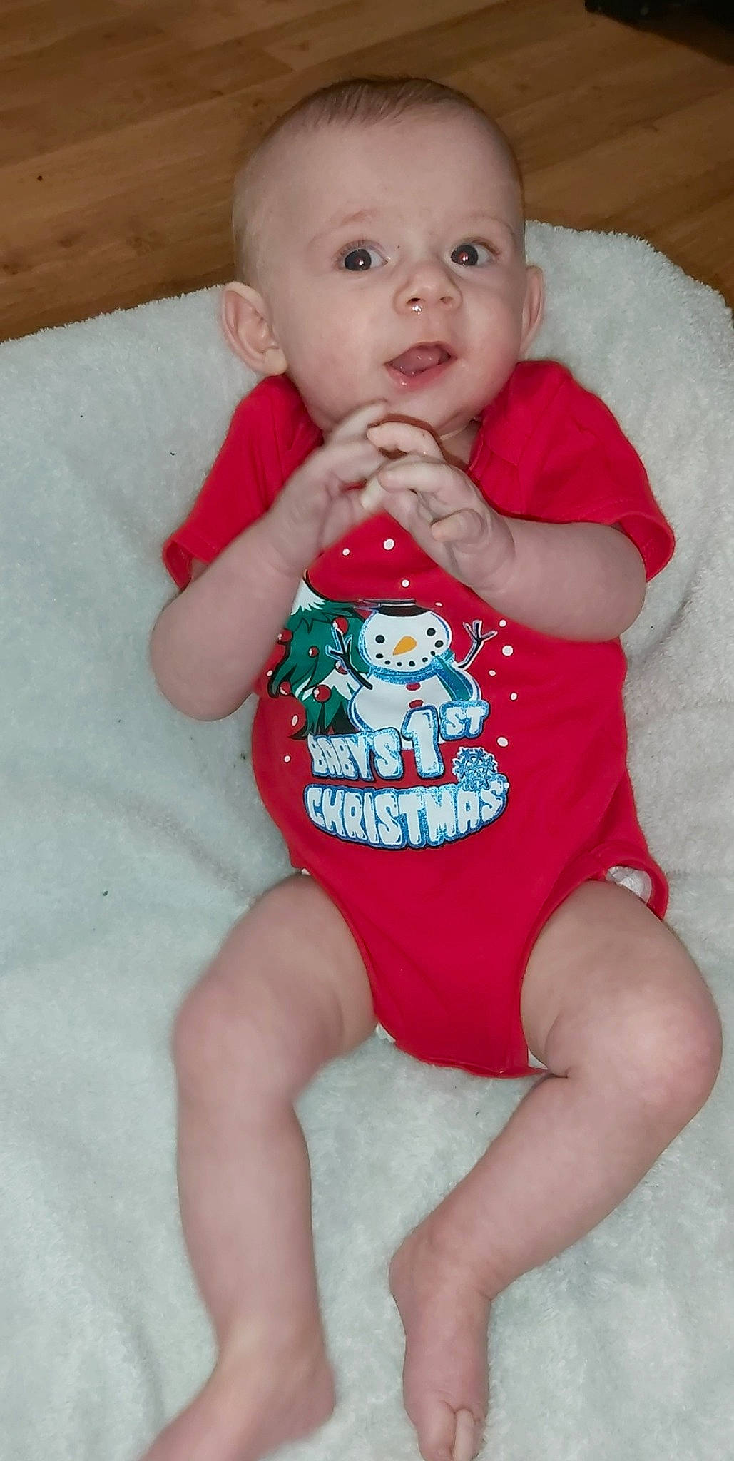 Lyrix is registered to the contest to win money with this photo: arm, baby_toddler_clothing, cheek, clothing, eye, face, finger, hair, happy, human_body, leg, lip, mouth, neck, nose, organ, person, pink, skin, sleeve