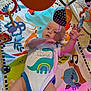 Wyatt is registered to the contest to win money with this photo: baby, carpet, child, colorful, cute, development, dinosaur_print, early_childhood, fabric, happy, indoor, infant, lying_down, onesie, patterned, play_mat, playtime, reaching, soft_lighting, toys