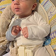 Wyatt joined the competition — help win amazing prizes! baby, infant, onesie, baby_seat, pacifier, clothing, face, hands, curious, straps, patterned, soft_toy, child, indoor, cute, looking_away, expression, small_fists, seatbelt, fabric