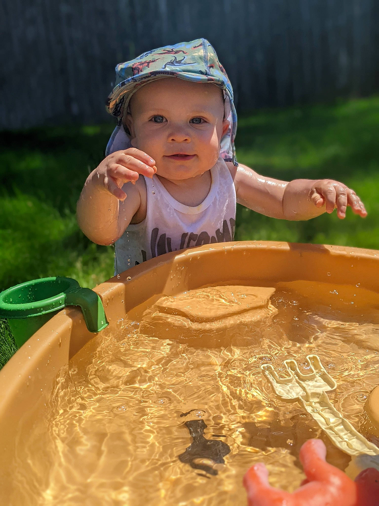 Brody is registered to the contest to win money with this photo: baby, baby_toddler_clothing, child, finger, fun, grass, happy, hat, headwear, leisure, people_in_nature, person, play, recreation, sand, sitting, sleeve, smile, soil, toddler
