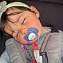 Léïa a rejoint le concours — aidez-le/la à gagner de superbes lots ! toddler, sleeping, pacifier, car_seat, headband, child, infant, cute, cozy, strap, toy, soft_lighting, face, closeup, clothing, baby, resting, indoors, peaceful, adorable