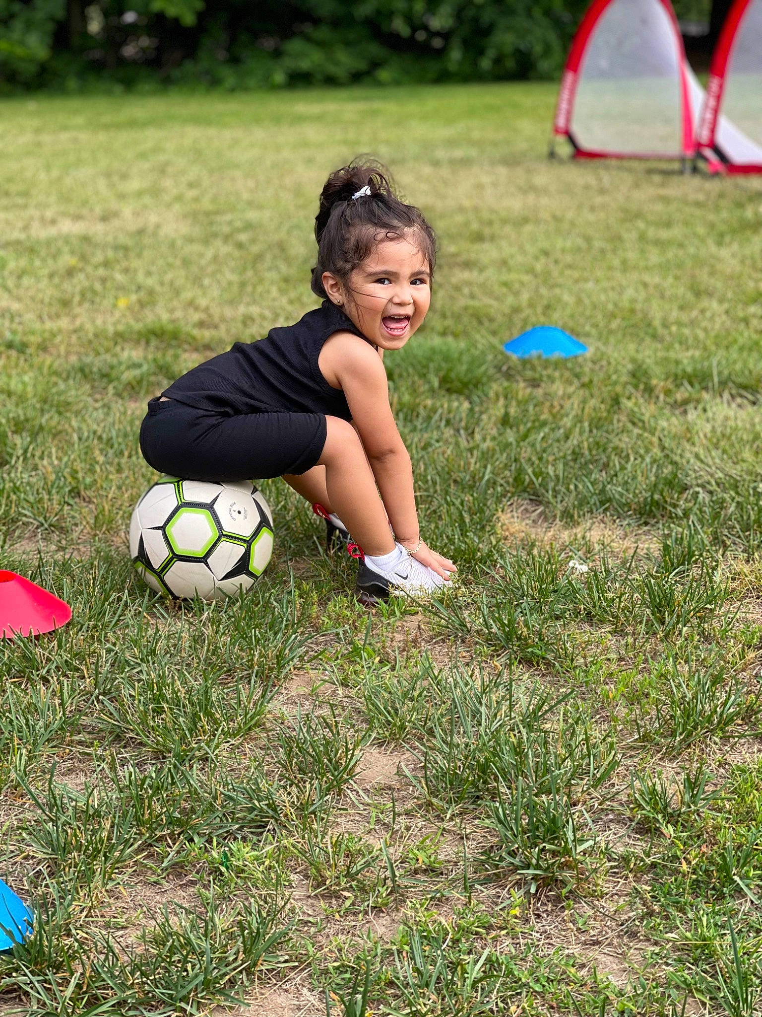 Ella joined the competition — help win amazing prizes! ball, ball_game, competition_event, football, fun, grass, happy, lawn, leisure, people_in_nature, person, player, playing_sports, recreation, shorts, soccer, soccer_ball, sports, sports_equipment, team_sport