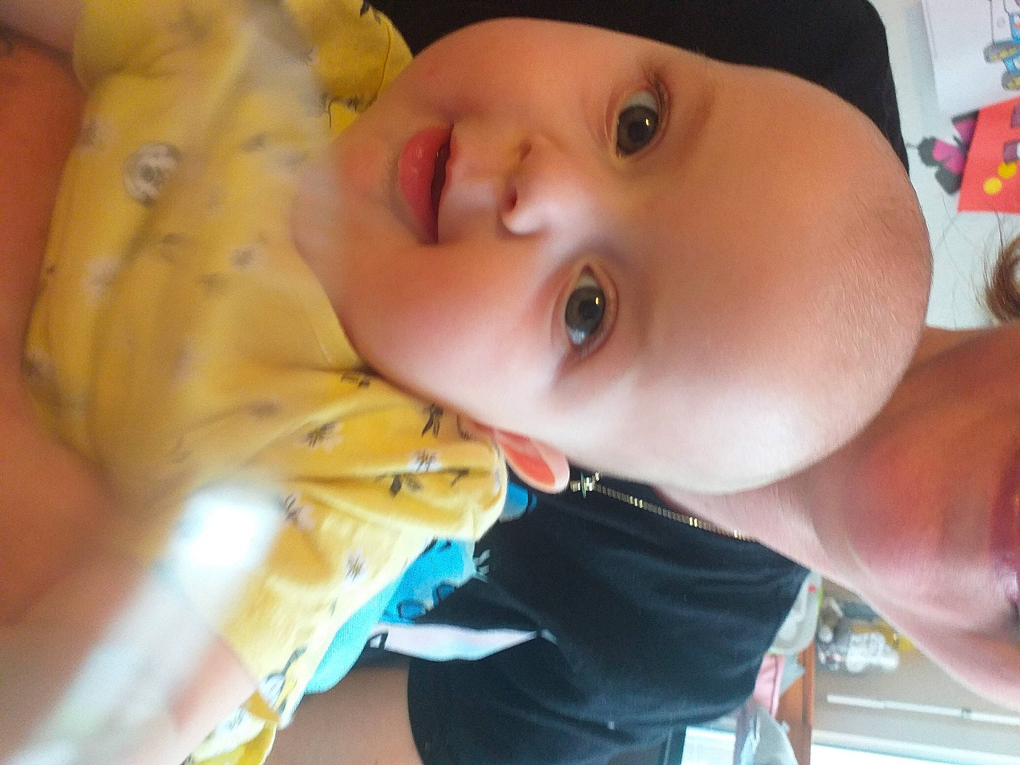 Mila participe au concours pour gagner de l'argent avec cette photo : baby, baby_toddler_clothing, cheek, child, eyebrow, eyelash, finger, forehead, fun, happy, hat, headgear, helmet, iris, lip, mouth, nose, person, skin, smile