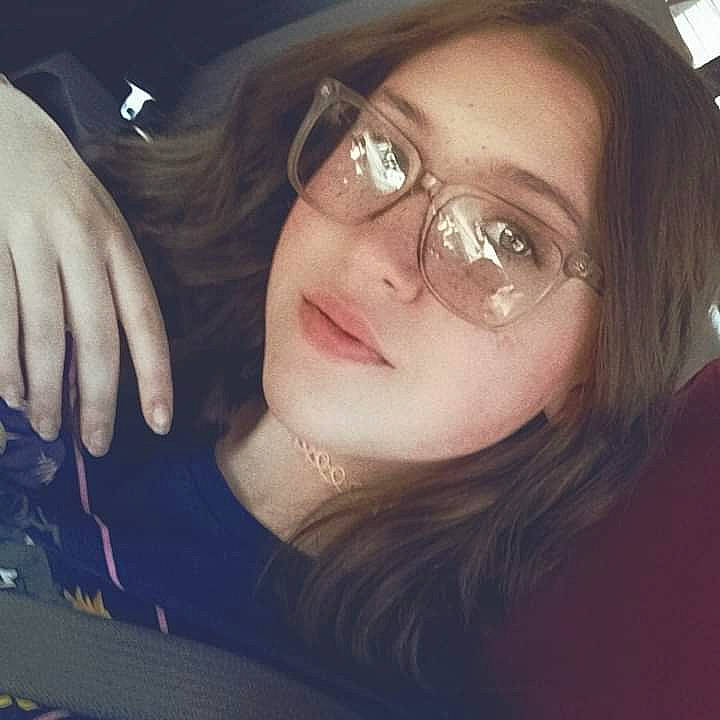 Chloe is registered to the contest to win money with this photo: black_hair, cheek, ear, eyebrow, eyelash, eyewear, finger, flash_photography, forehead, gesture, glasses, happy, jaw, lip, mouth, nose, person, skin, smile, tints_and_shades