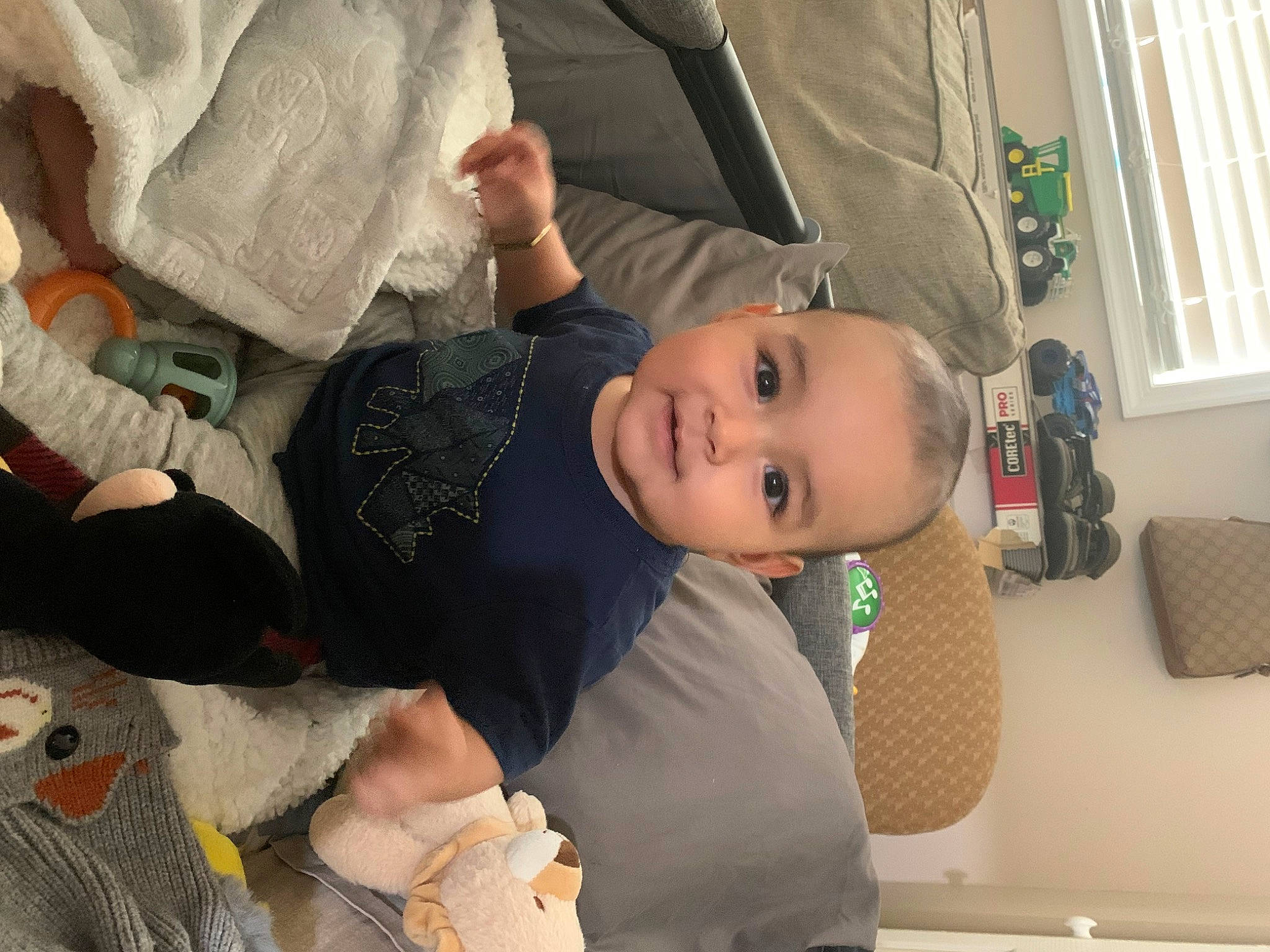 Eduar is registered to the contest to win money with this photo: baby, baby_products, child, comfort, fun, fur, happy, hat, houseplant, lap, linens, person, room, sitting, smile, textile, toddler