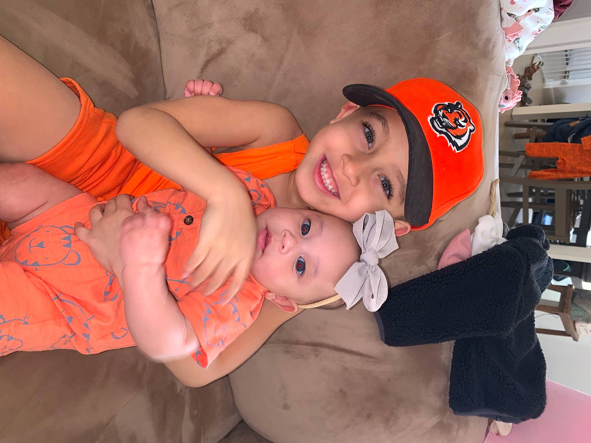 Elijah is registered to the contest to win money with this photo: abdomen, baby, chest, child, event, eye, facial_expression, finger, fun, happy, hat, headwear, human_leg, joy, mouth, person, room, skin, smile, thigh