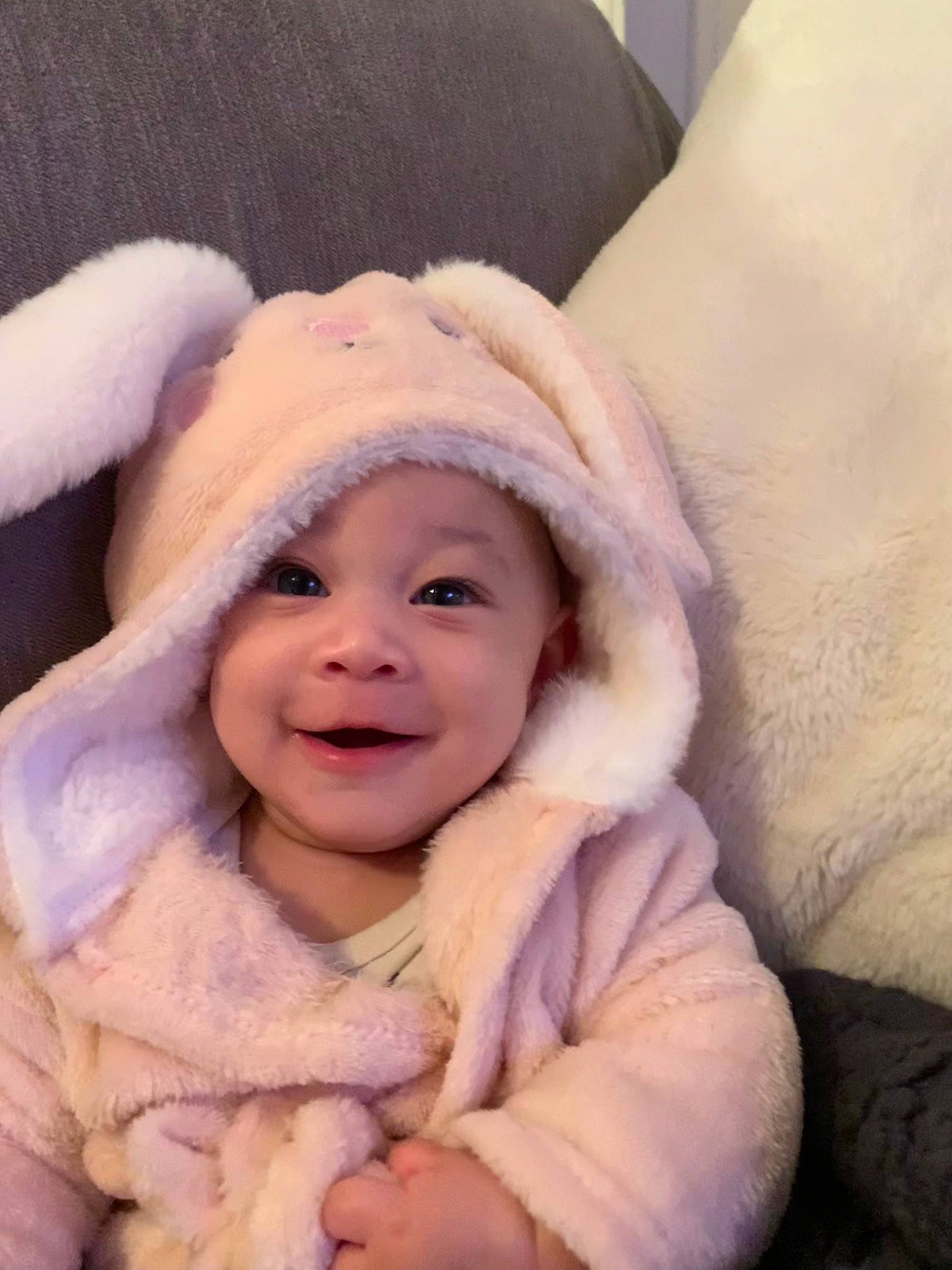 Amarah is registered to the contest to win money with this photo: baby, baby_toddler_clothing, cap, cheek, comfort, eye, fun, fur, fur_clothing, gesture, happy, head, headwear, iris, joy, laugh, nose, parka, person, smile