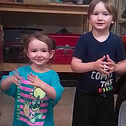 Christopher Thomas joined the competition — help win amazing prizes! child, children, boy, girl, smile, clothing, shorts, shirt, indoor, workshop, garage, tools, shelf, storage, happy, person, standing, young, casual, clapping