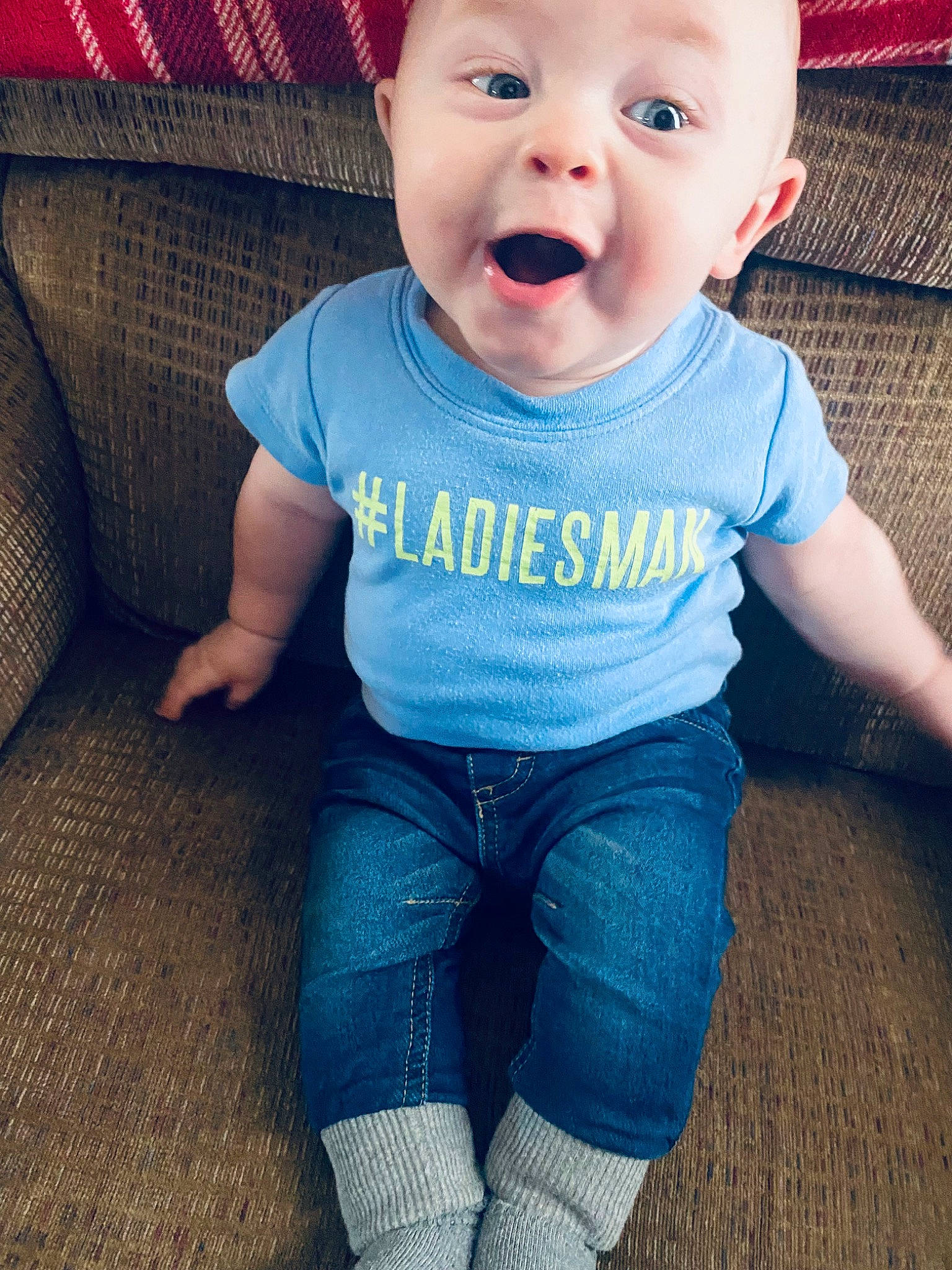 Henlee is registered to the contest to win money with this photo: baby_toddler_clothing, blue, cheek, chin, clothing, eye, face, happy, head, human_body, iris, leg, lip, mouth, neck, nose, organ, person, skin, sleeve